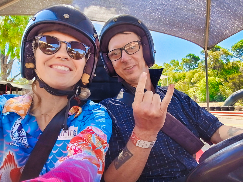 mighty mentor and a student driving go karts in perth